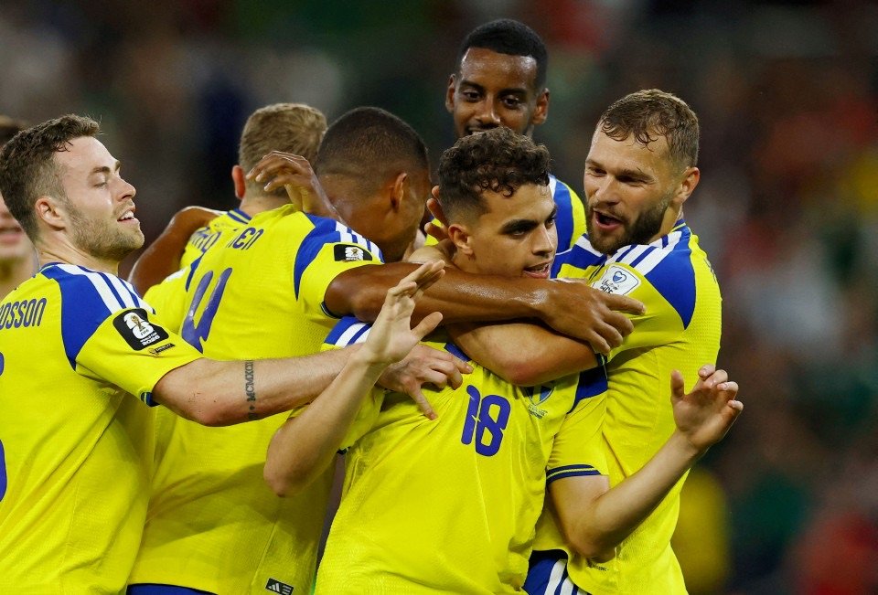 Sweden players celebrate during their 5-1 World Cup win over Tunisia as Yasin Ayari scores twice