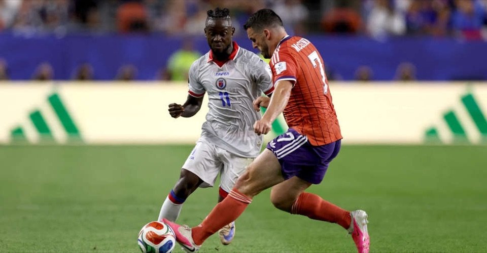 Scotland and Haiti players contest the ball during their 2026 World Cup Group C match